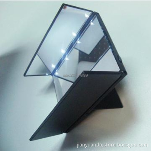 Three sided standing makeup mirror with 8 led lights